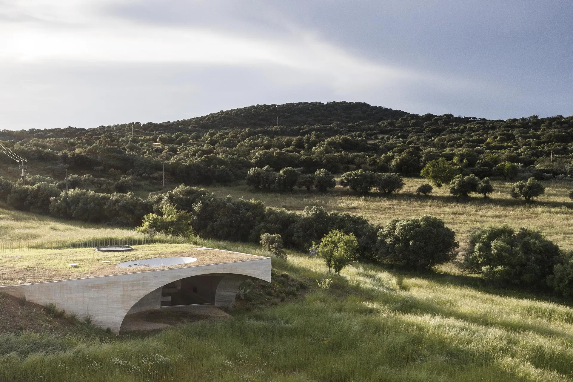 Casa na Terra underground villa in Alentejo Portugal with dome structure and lake views by Aires Mateus architects