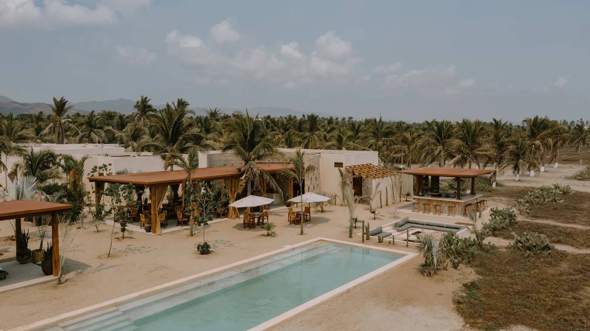 Casa Yuma's serene outdoor space with a private pool and sun loungers.