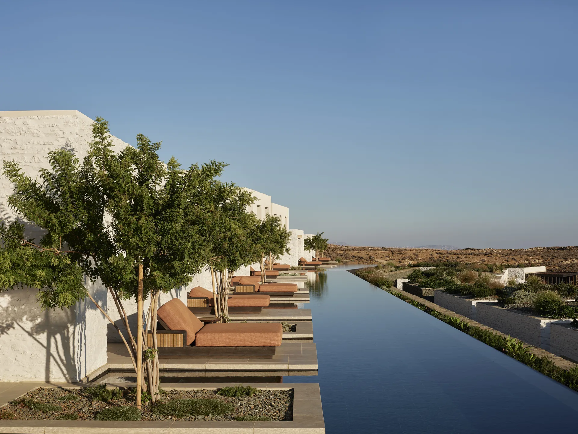 Infinity pool view at Odera, Tinos with sweeping Aegean Sea backdrop