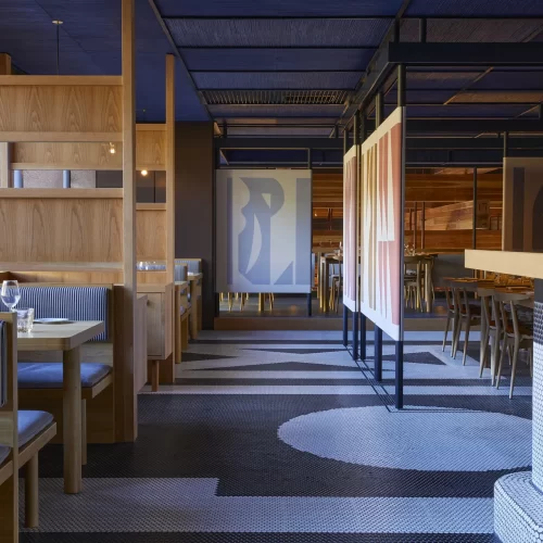 Elegant dining area at Ace Hotel Kyoto featuring a blend of modern and traditional Japanese design.