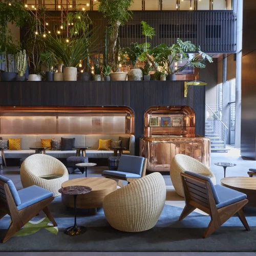 Modern lobby area of Ace Hotel Kyoto with stylish interior design and welcoming ambiance.